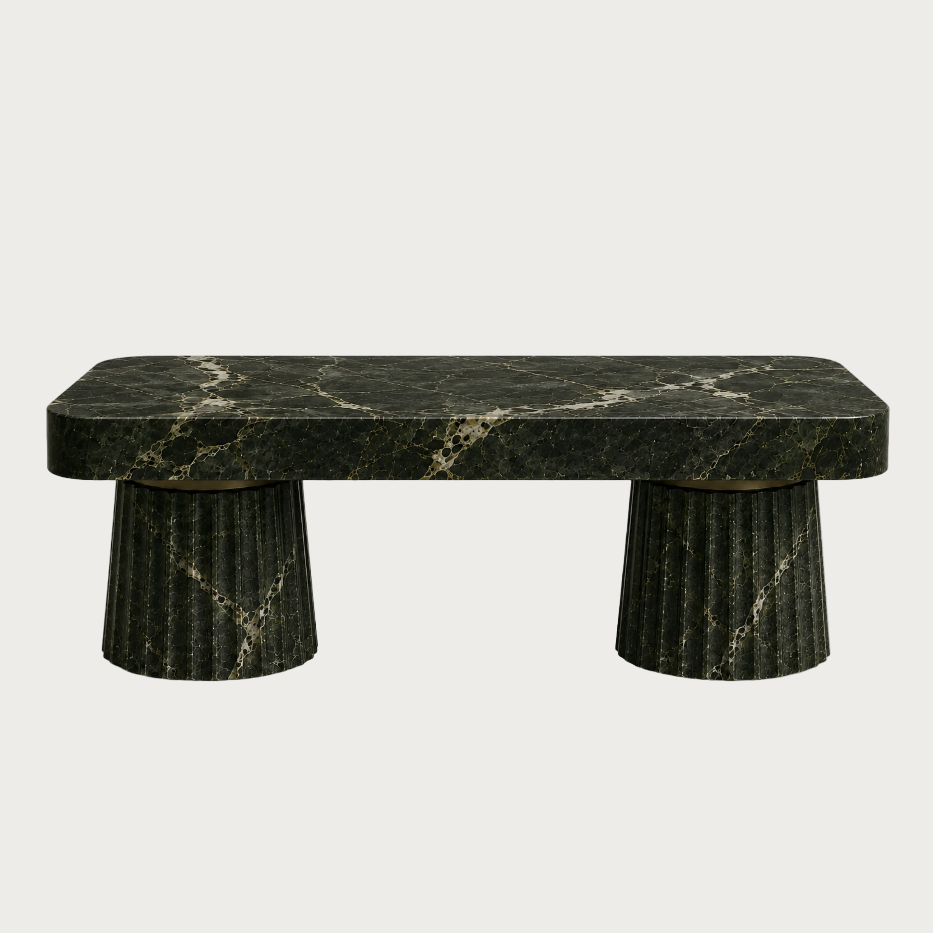 A modern kitchen island made of dark green marble with natural veining and fluted pedestal legs.