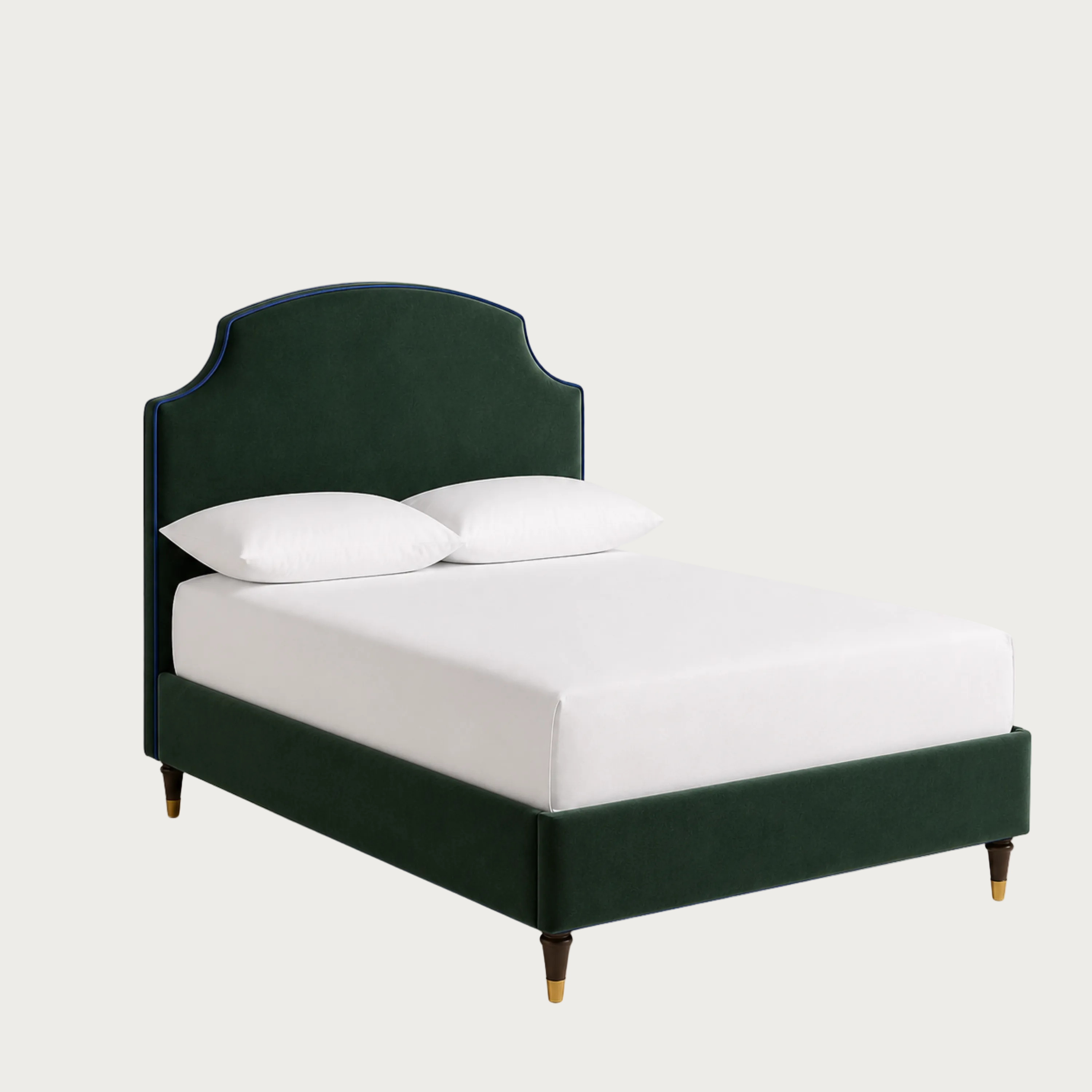 A dark green upholstered bed frame with a curved headboard and matching footboard, shown with a white mattress and two white pillows.
