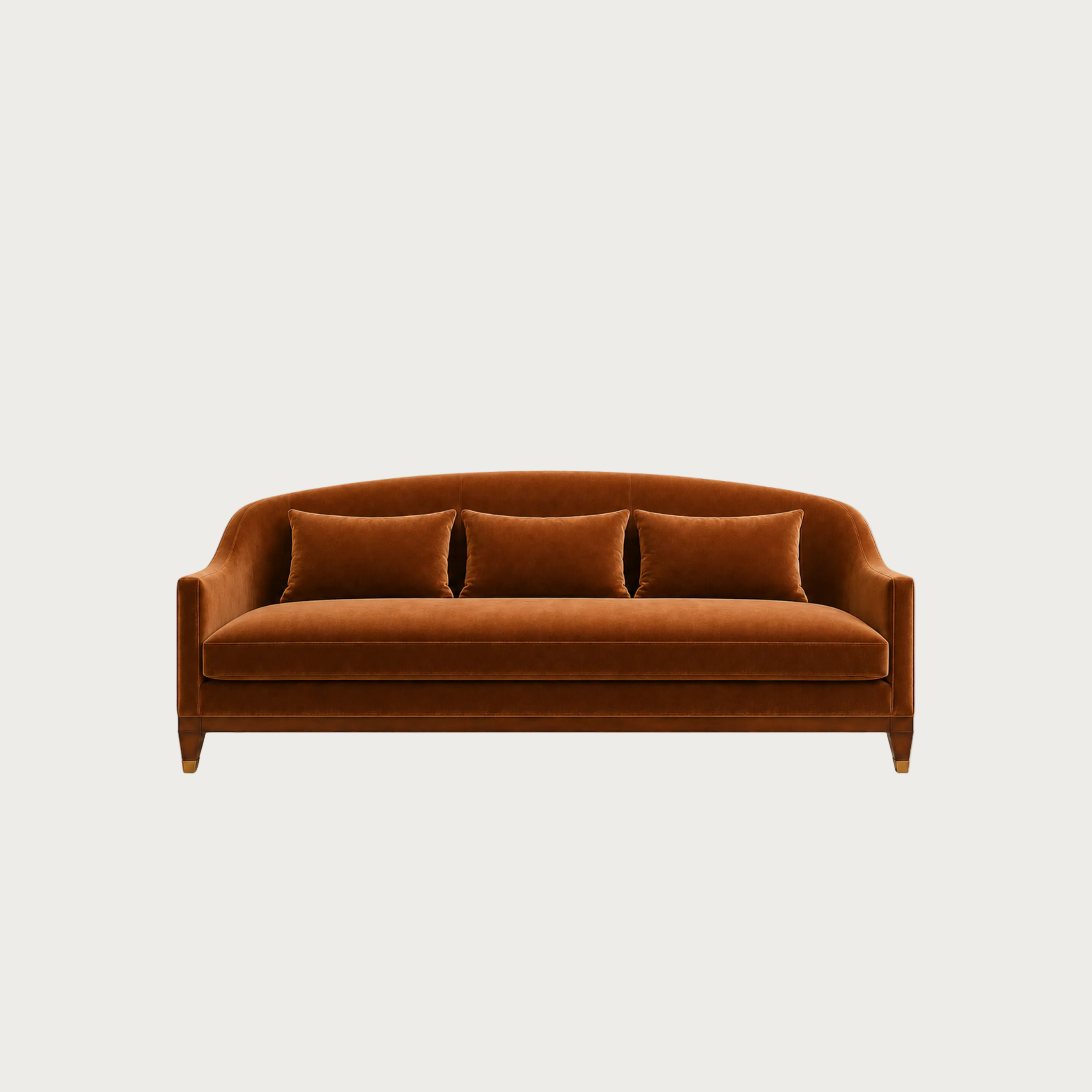 A modern three-seat sofa upholstered in rich rust-orange velvet, featuring a curved backrest, three matching throw pillows, and tapered wooden legs, shown against a solid light gray background.