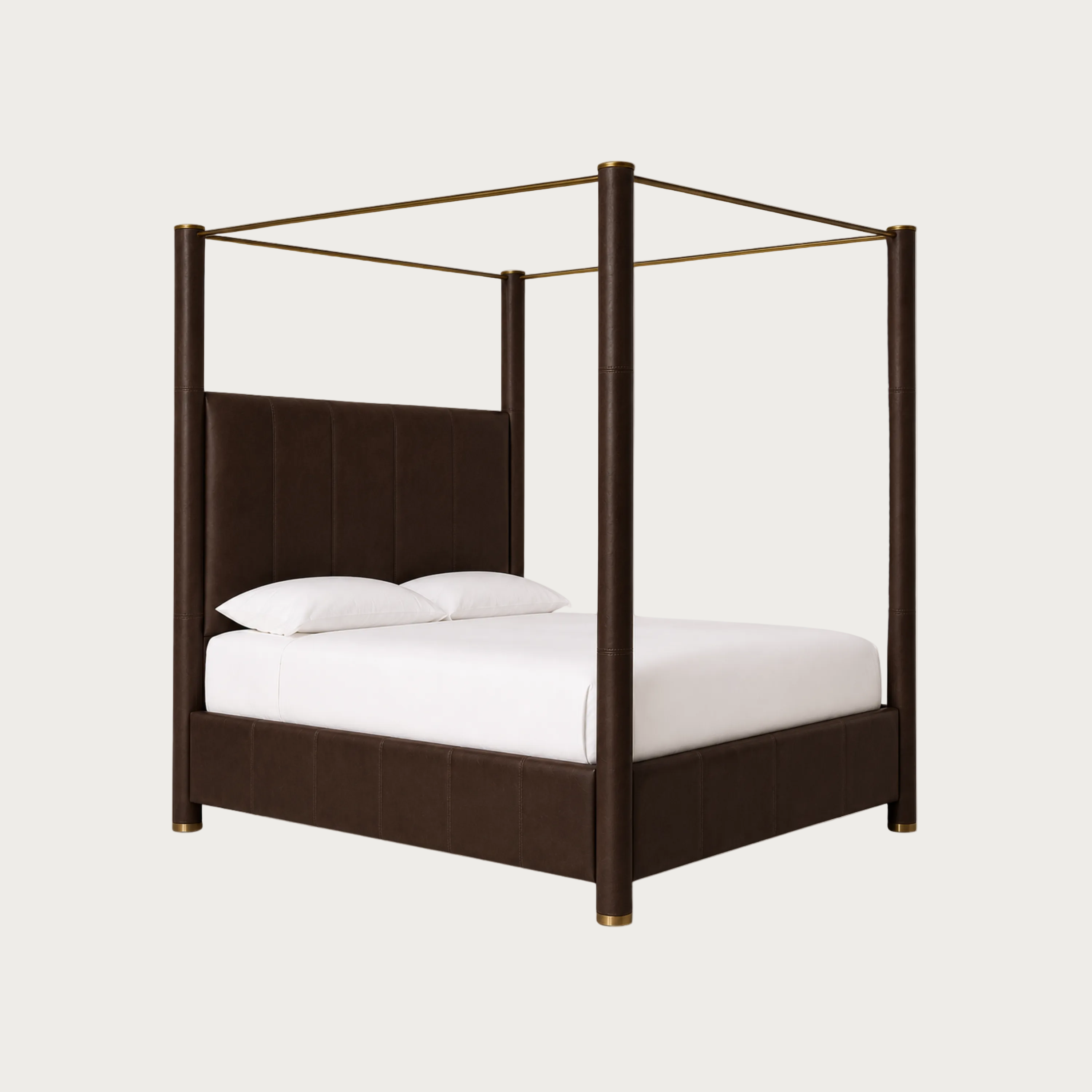 A dark brown upholstered canopy bed with a padded headboard and matching footboard, supported by four vertical posts with thin gold-toned top rails, shown with white bedding on a light gray background.