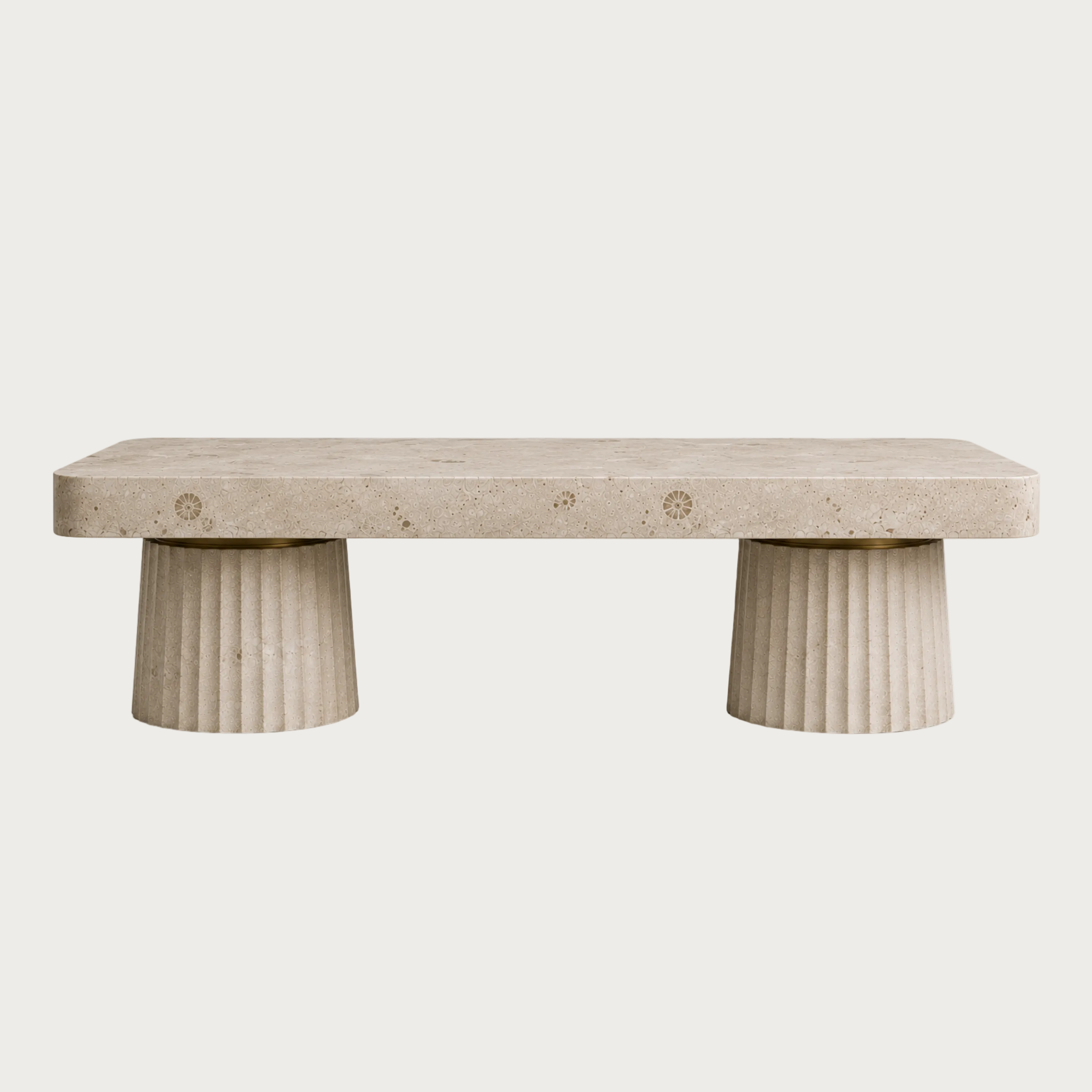 A modern kitchen with a rectangular fossil top and two fluted cylindrical pedestal legs.