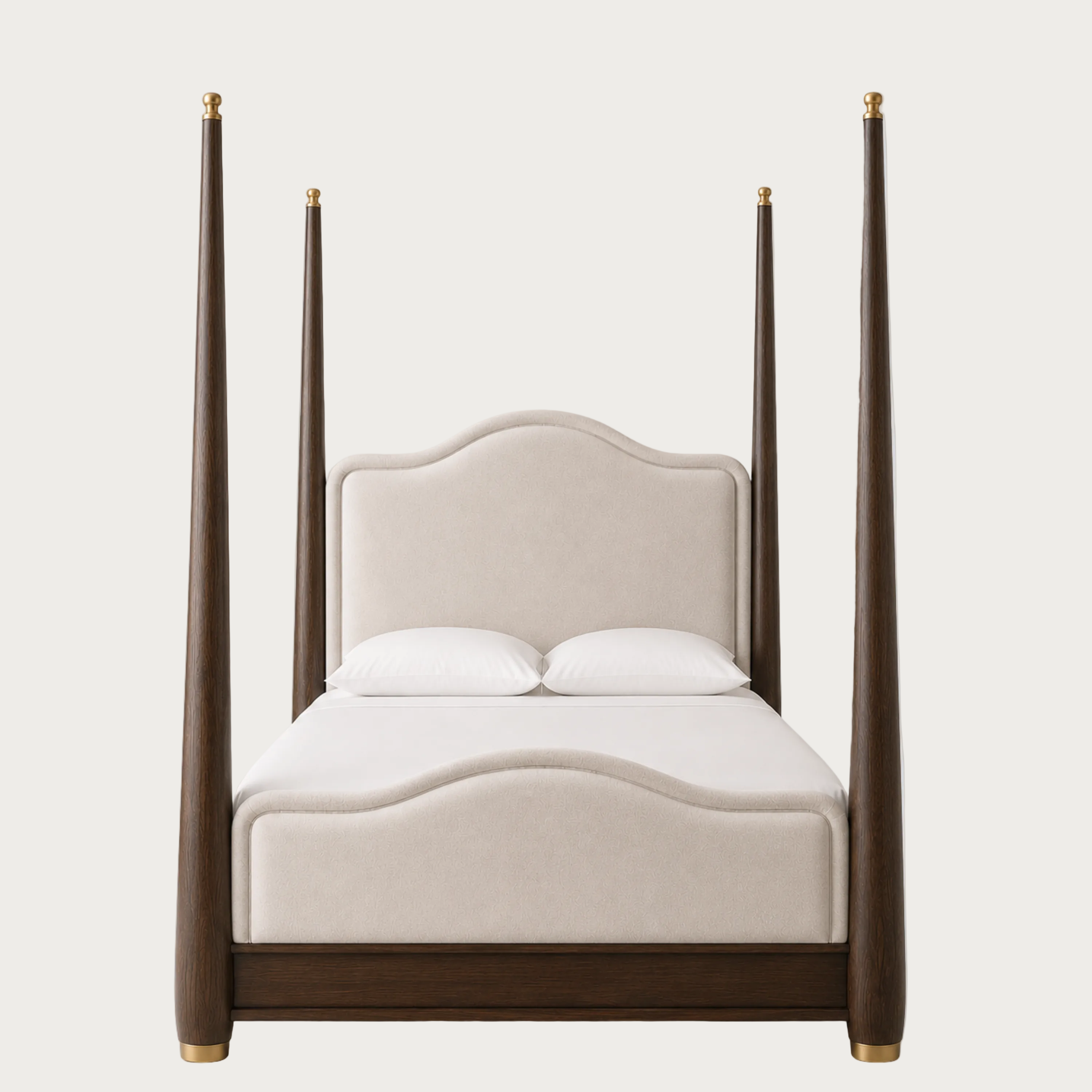 A modern four-poster bed featuring a dark brown wood frame with gold-toned metal caps on the posts and footboard, paired with a cream upholstered headboard and white bedding, shown against a solid light gray background.