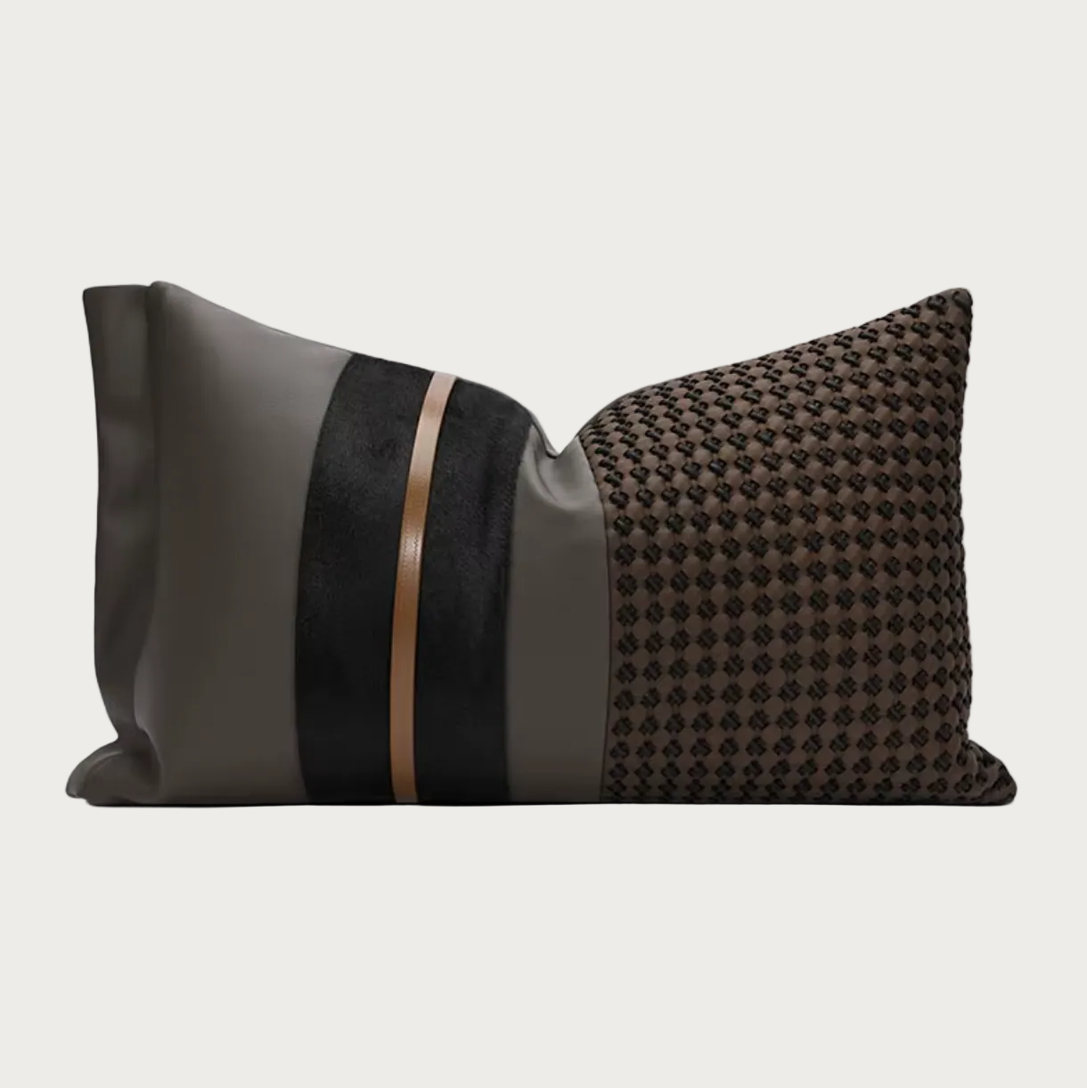 A modern decorative throw pillow featuring a tri-color design: a smooth dark gray panel on the left, a vertical black velvet stripe with a thin metallic bronze accent in the middle, and a textured black-and-brown houndstooth pattern on the right, shown on a plain white background.
