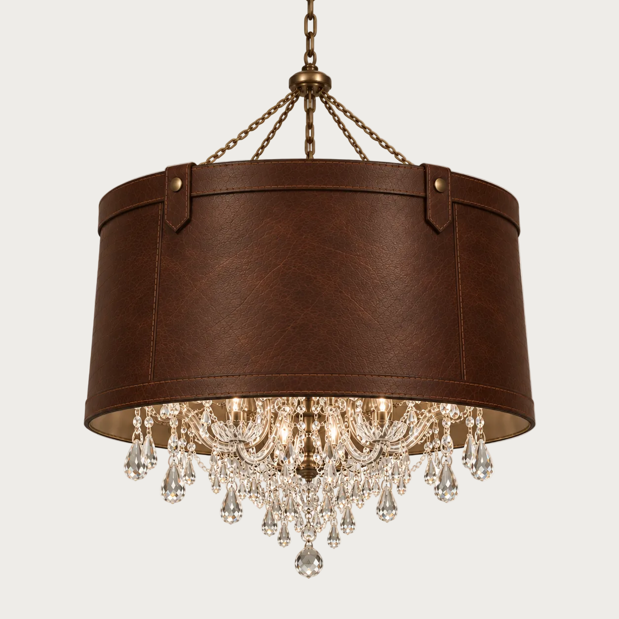 A brown genuine-leather drum pendant chandelier shade with brass-toned hardware and cascading clear crystal droplets.