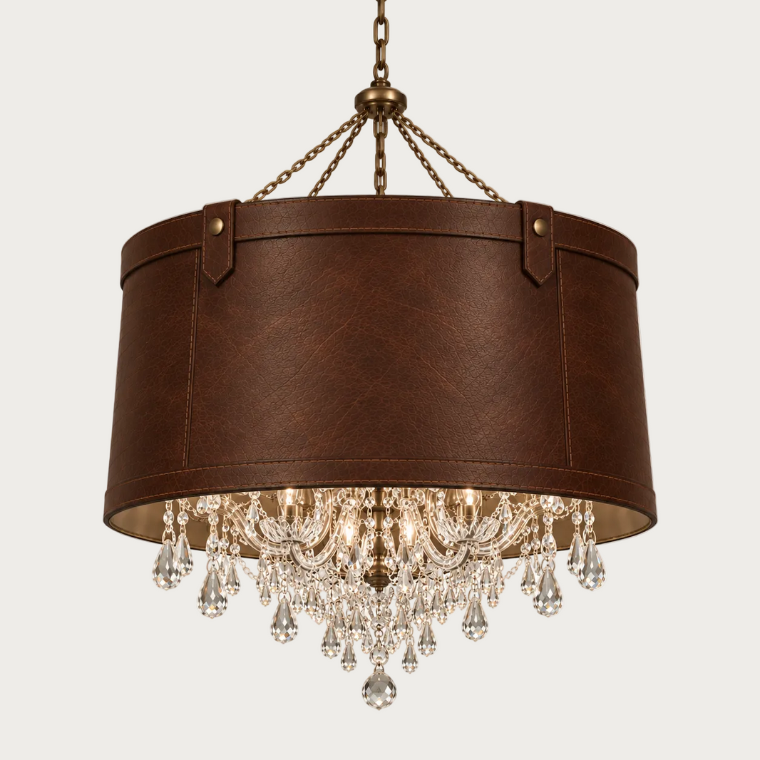 A brown genuine-leather drum pendant chandelier shade with brass-toned hardware and cascading clear crystal droplets.