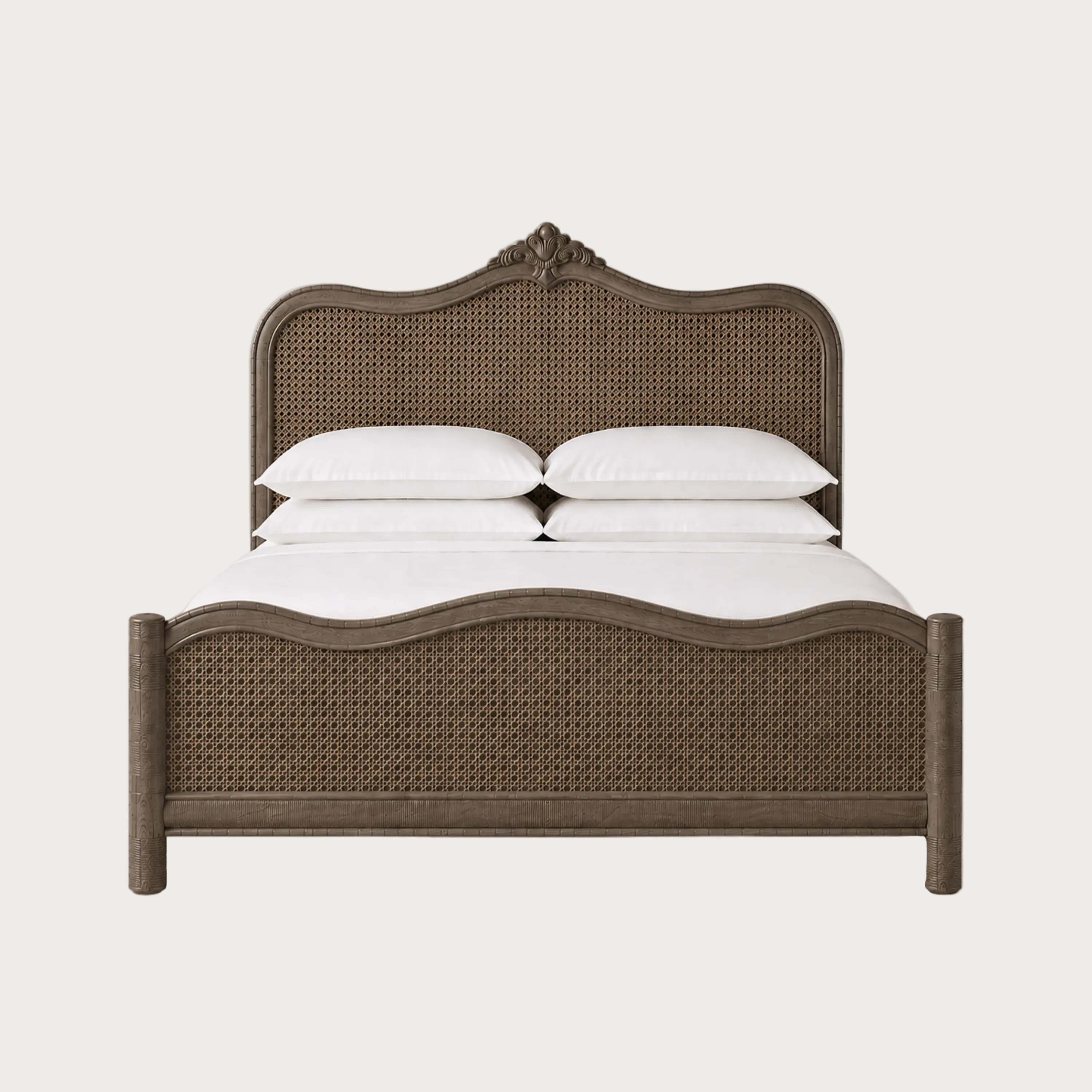 A bed with a dark brown woven cane headboard and footboard,.